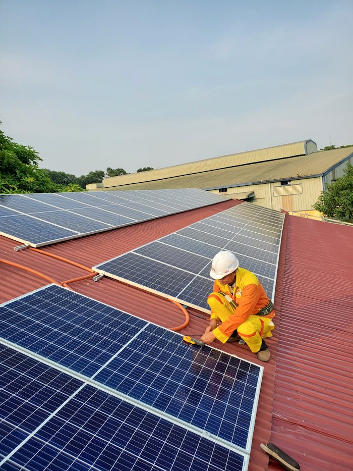 pexels-photo-14613939 A Man Installing Solar Panels